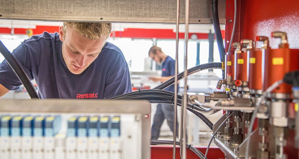 Photo: engineer working on a Resato hydrogen refueling system